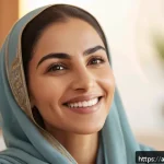 Home 23 안면 리프팅 효과 - A serene Middle Eastern woman in her early 30s performing facial exercises in a sunlit modern living...